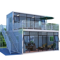 Maison préfabriquée modulaire de luxe à deux étages, assemblage rapide, conteneur de 20 pieds avec cuisine, salon et terrasse sur le toit