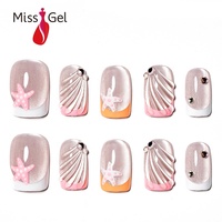 Lot de 32 faux ongles courts amovibles style plage œil de chat avec motif étoile de mer et strass