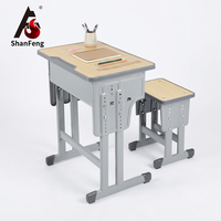 Ensemble de bureau et chaise individuels réglables pour étudiant avec tiroir et crochet pour cartable, plateau en HDF, idéal pour les salles de classe du primaire - Vente en gros