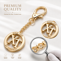 Pendentif de sac de luxe en alliage de zinc doré poli avec motif loup hurlant et logo de marque gravé, porte-clés métallique personnalisé