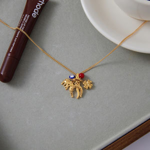 J & D Trendy 18K chapado en oro de acero inoxidable colgante collar herradura elefante aceite goteo collar de ojo de demonio - Product Image 3