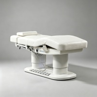 Table de massage électrique chauffante de luxe à 4 moteurs avec commande au pied et base LED pour salon de beauté, spa médical et clinique des cils