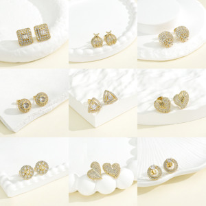 Pendientes de tuerca de circonita chapados en oro de cobre para mujer, joyería de moda al por mayor, de lujo, con circonitas cúbicas en forma de corazón, triángulo, redondo y estrella. - Product Image 1