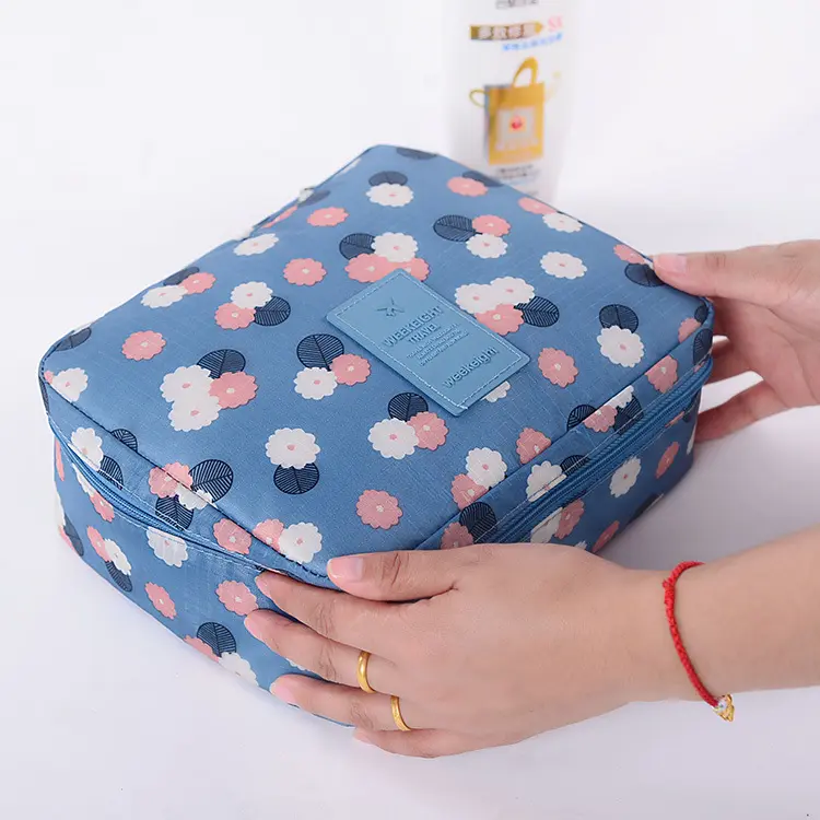 Yeni çiçek baskılı seyahat su geçirmez losyon ambalaj çanta promosyon özelleştirilmiş makyaj çantası