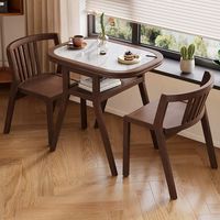 Ensemble table et chaises pliantes minimalistes en ardoise, résistant aux rayures et à la chaleur, idéal pour balcon et petits appartements