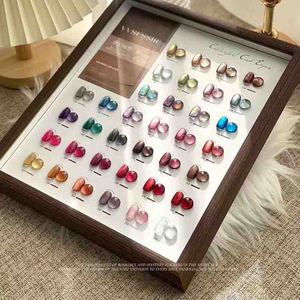 ชุดยาทาเล็บเจลตาแมว 36 สี แบบลอกออกได้ ใช้กับยูวีและแอลอีดี พร้อมการ์ดสีเคลือบเงา แม่เหล็กสำหรับทำเล็บ ขายส่งสำหรับร้านทำเล็บ - Product Image 1