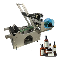 Étiqueteuse horizontale semi-automatique pour bouteilles rondes MT-50, alimentation CC, durable pour bouteilles alimentaires en verre, certifiée CE/ISO