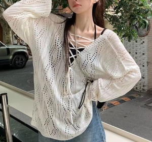 Blusa de punto blanca para mujer con <span class=keywords><strong>tirantes</strong></span> de resorte para usar 2024 nuevo estilo diseño perezoso nicho hueco <span class=keywords><strong>Top</strong></span> sin espalda - Product Image 1