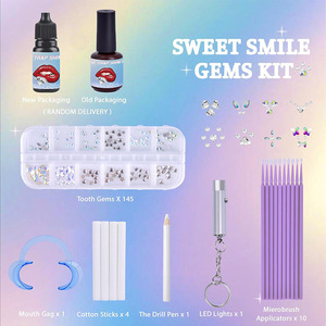 Kit de gemme de <span class=keywords><strong>dent</strong></span> de décoration de gemme de dents dentaires de Offre Spéciale avec la lumière de polymérisation et les gemmes solides de <span class=keywords><strong>dent</strong></span> de pierre de cristal de colle - Product Image 2