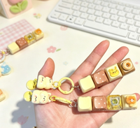 Mini clavier anti-stress portable avec breloque clavier, jouet sensoriel et pendentif clicker avec motif de dessin animé mignon, idéal comme cadeau pour étudiants
