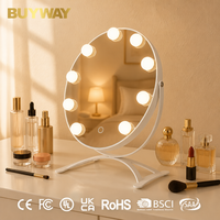 Miroir de maquillage rond blanc de style Hollywood avec neuf ampoules et bras en U inclinable, miroir de vanité de table avec base arquée à quatre pieds