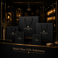 Sacs en papier cartonnés noir mat de luxe personnalisés avec logo estampé à chaud argenté pour emballage de bijoux, cadeaux et mode en boutique