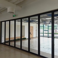 Porte coulissante pliante en alliage d'aluminium pour centre commercial, garage, salon et balcon