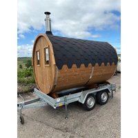 Fassförmige Mobile Sauna mit Naturholzpaneelen, Schwarzem Schindeldach und Anhängerrahmen für Gewerbliche Nutzung, Umweltfreundliches Design