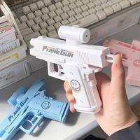 Pistolet à eau créatif double face, jouet de farce à jet d'eau bidirectionnel, mini pistolet à eau pour jeu estival, cadeau d'anniversaire