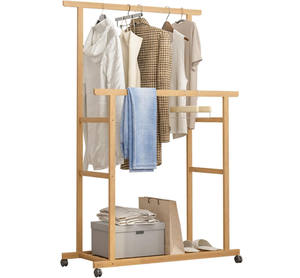 Porte-<span class=keywords><strong>vêtements</strong></span> en bambou <span class=keywords><strong>à</strong></span> double barre <span class=keywords><strong>sur</strong></span> <span class=keywords><strong>roulettes</strong></span> avec étagère inférieure pour le rangement des chaussures, organisateur de <span class=keywords><strong>vêtements</strong></span> <span class=keywords><strong>sur</strong></span> pied pour la chambre <span class=keywords><strong>à</strong></span> coucher - Product Image 1