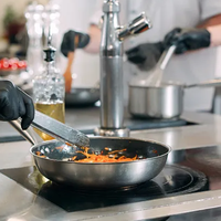 Poêle à frire en acier inoxydable résistante aux hautes températures pour la restauration, sans revêtement, avec poignée rivetée