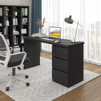 Bureau d'ordinateur moderne en bois noir avec tiroirs pour petit espace, poste de travail minimaliste pour bureau à domicile