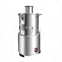 Petite machine à éplucher l'ail électrique automatique pour la maison Machine à éplucher le gingembre et l'ail secs