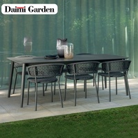 Ensemble table et chaises de salle à manger d'extérieur en bois tressé, moderne et simple, imperméable et durable, service personnalisé pour cour, villa, hôtel