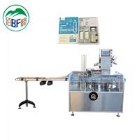 Machine d'emballage entièrement automatique pour 2 ampoules et 1 flacon dans une boîte en carton