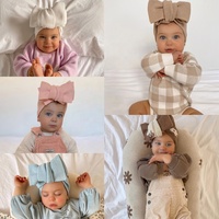 Nouvelle tendance doux populaire coton tricoté gros tricot surdimensionné Topnot couleur unie moucheté tricoté bébé bandeau