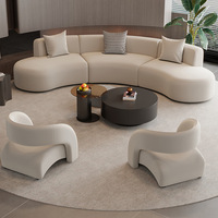 Ensemble canapé incurvé une place et table basse en PU pour salon de beauté, club, espace lounge, hall d'hôtel, bureau de vente, salle de réunion, coin réception