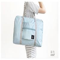 Sac de voyage pliable léger en Oxford Ripstop avec poche externe zippée, capacité 20-35L, idéal pour les week-ends et le rangement de matériel de sport