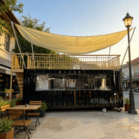 Kiosque de restauration rapide en conteneur maritime contemporain à deux étages, bar à café, utilisation optimisée de l'espace, robuste, durable, galvanisé