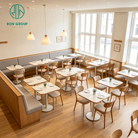 Ensemble de mobilier commercial Ron Group pour restaurant : Table carrée en marbre, chaise rembourrée en tissu, banquette personnalisée