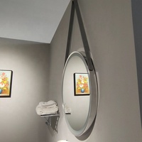 Miroir LED de salle de bain intelligent au design élégant de 600 mm, design minimaliste rond avec détection tactile