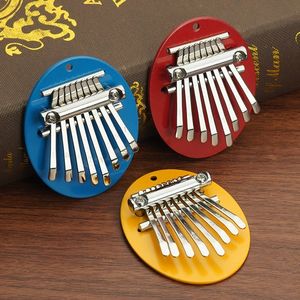 Mini Kalimba de 8 tonos de alta calidad, piano portátil para principiantes, pequeño piano de dedo con base de metal, colgante de juguete - Product Image 1