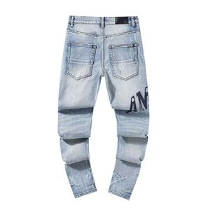 Nouveau style de la marque de mode urbaine, jeans déchirés tendance, patchwork, brodés, élastiques, coupe slim, personnalisés pour hommes - Product Image 3