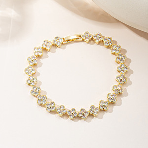 Bracciale all'ingrosso con quadrifoglio e zirconi, gioielli a catena con fiori multicolori placcati oro in rame per donna - Product Image 3