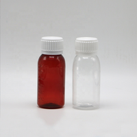 Flacon vide de 60 ml (2 oz) en PET transparent ambré avec bouchon inviolable anti-déversement pour sirop contre la toux et médicaments pour enfants