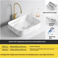 Lavabo de comptoir en céramique avec 5 ans de garantie et poignée unique pour les projets de toilettes d'hôtel et de villa