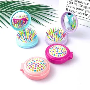 Großhandel Taschen-Pop-Up-Regenbogen-Haarbürste Reisekammer-Haarbürste kleine komplizierte Haarkamme mit Mini-Spiegel