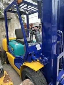 Used Komatsu FD30 Diesel 3 Tons 4WD <b>Forklift</b> with Hydraulic Side Shifter Rough Terrain Solid Tires Multi-Stage Mast - Product Image 3