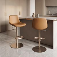 Chaise de bar de luxe pour îlot de cuisine, avec assise rembourrée douce, piétement en métal champagne brillant, repose-pieds et réglage de la hauteur
