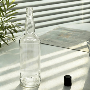 Botella de Vodka de 1000 ml con Tapas de Rosca, Botella Redonda Transparente Clásica para Whisky, Tequila, Ginebra, Botella de Licor de Vidrio para Destilerías - Product Image 1