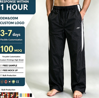 Pantalon noir surdimensionné à jambe droite personnalisé, streetwear, 100% nylon, imperméable, avec cordon de serrage, logo brodé, pantalon rayé blanc