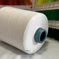 Fil de polyester à fibres courtes Yizheng 40/1 brillant brut pour la production de fil à coudre
