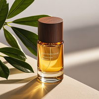 Vente en gros de bouteilles de parfum vides en verre avec logo personnalisé et bouchon en bois de 10ml 30ml 100ml pour emballage de marque de Cologne