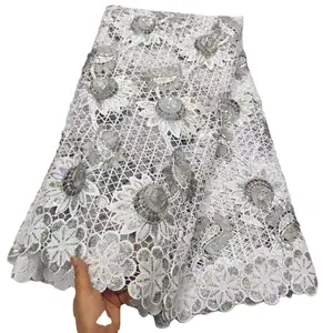 2024 precio al por mayor blanco puro nuevos diseños cordón africano de alta calidad guipur encaje Nigeria tela de encaje para vestido de novia de Dama