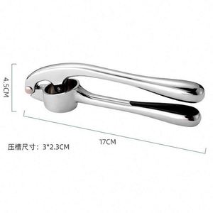 Easy to Squeeze Handle Kitchen Premium Garlic Press with Silicone Garlic Peeler and Cleaning Brush - Product Image 2