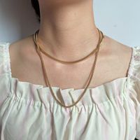 Chaîne de trombone délicate en or 18 carats collier chaînes cubaines en acier inoxydable sans ternissement trombone chaîne à maillons à chevrons torsadés