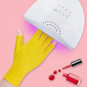 <span class=keywords><strong>Gants</strong></span> en Spandex Blanc/Noir <span class=keywords><strong>Anti</strong></span>-<span class=keywords><strong>UV</strong></span> 20*8cm pour Outils de Nail Art et Manucure – 1 Paire - Product Image 2