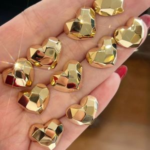 Xinfly <b>Fine</b> Jewelry Supplier Women Fashion Luxury Pure Real 18k Gold Hollow Heart Shape <b>Stud</b> <b>Earrings</b> - Product Image 3