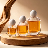 Flacon de parfum en verre de forme octogonale 30ml/50ml/100ml avec pulvérisateur à pompe et emballage en carton pour parfum et cosmétiques