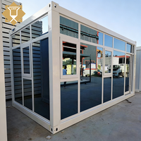 Maison conteneur à montage rapide de 20 pieds avec mur en verre – Bureau ou boutique préfabriqué de luxe, modulaire, à construction rapide, au prix le plus bas pour l'extérieur